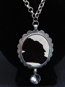 COW HIDE PENDANT ON CHAIN NECKLACE