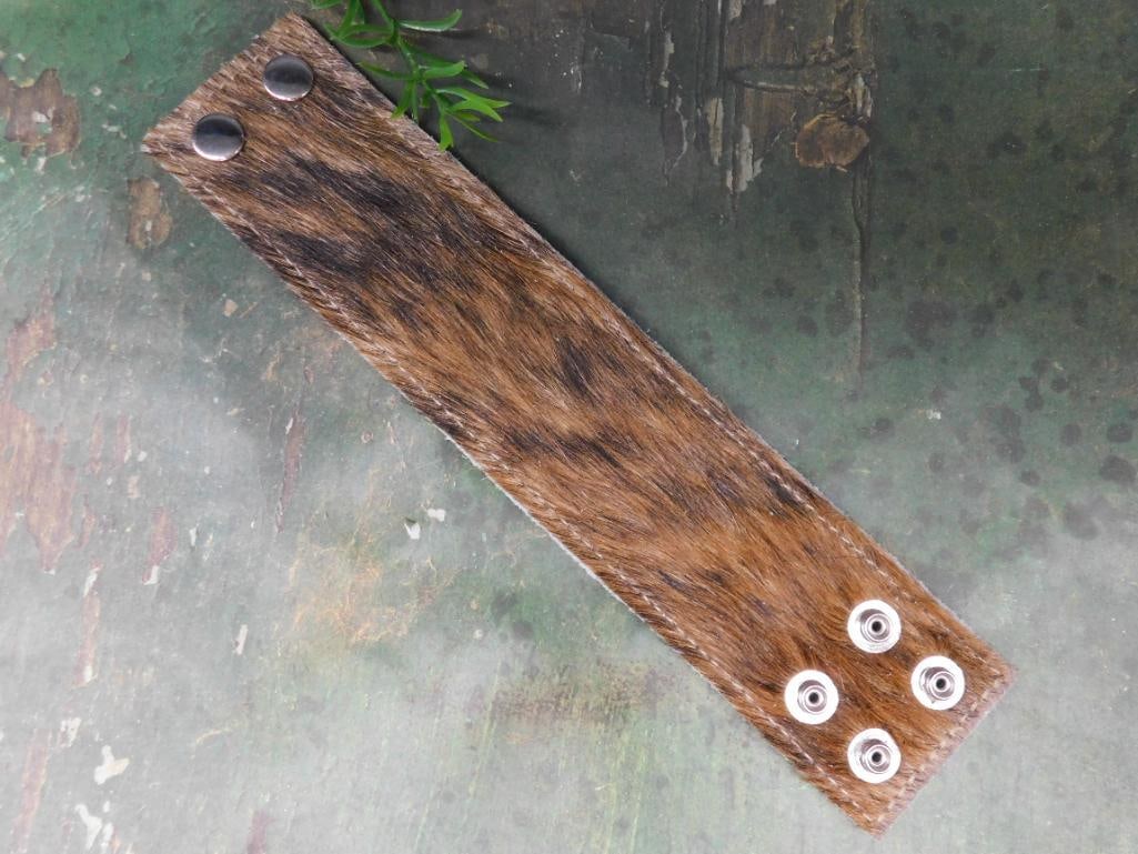 COWHIDE MONEY HOLDER BRACELET: COWHIDE MONEY HOLDER BRACELET