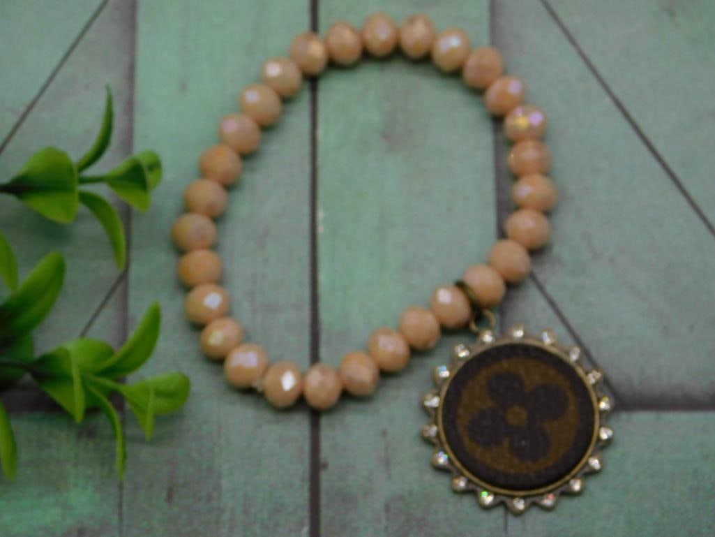 UPCYCLED LOUIS VUITTON BRACELET ROCK STONE LAPIDARY SPECIMEN: UPCYCLED LOUIS VUITTON BRACELET ROCK STONE LAPIDARY SPECIMEN