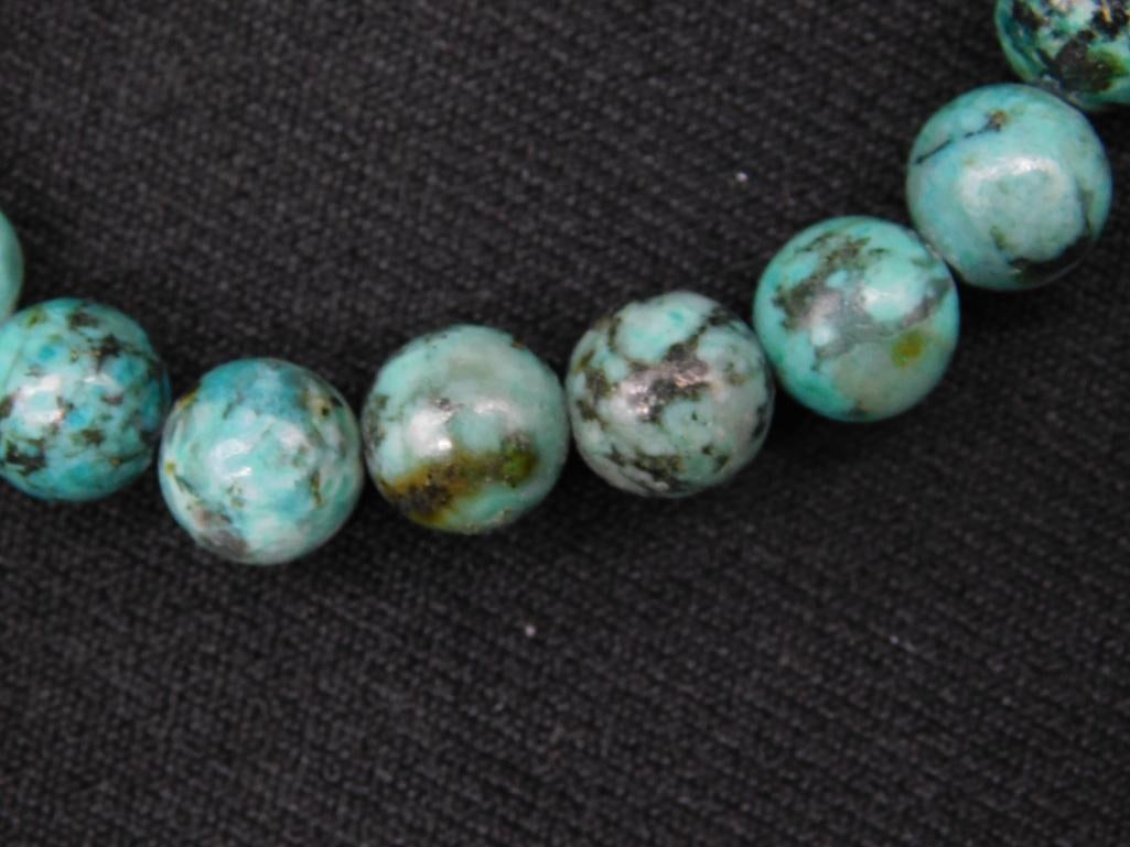 Stretch Bracelet With Variegated Green Beaded Design - 2