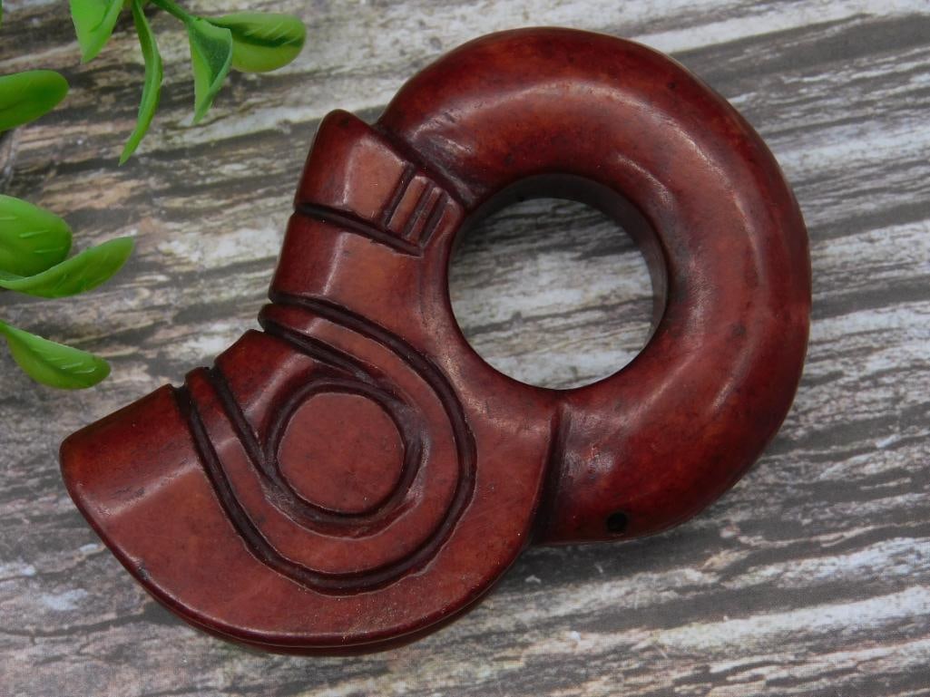 Carved Red Jade Pendant with Circular Design: Carved Red Jade Pendant with Circular Design