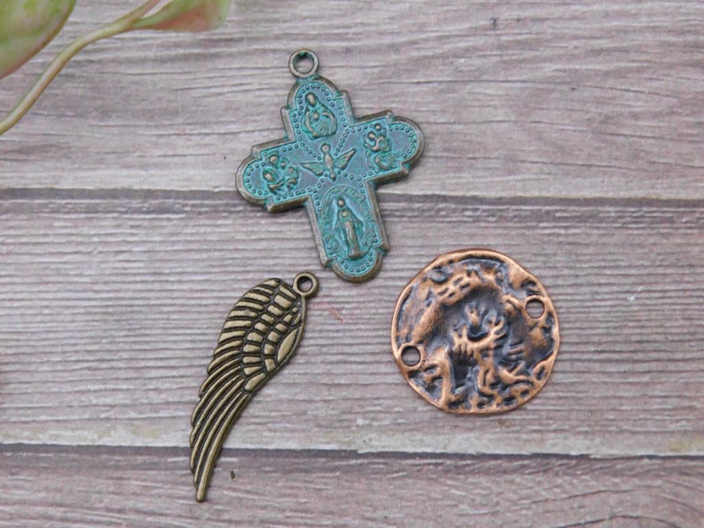 Mixed Metal Religious and Wing Pendant Lot: Mixed Metal Religious and Wing Pendant Lot