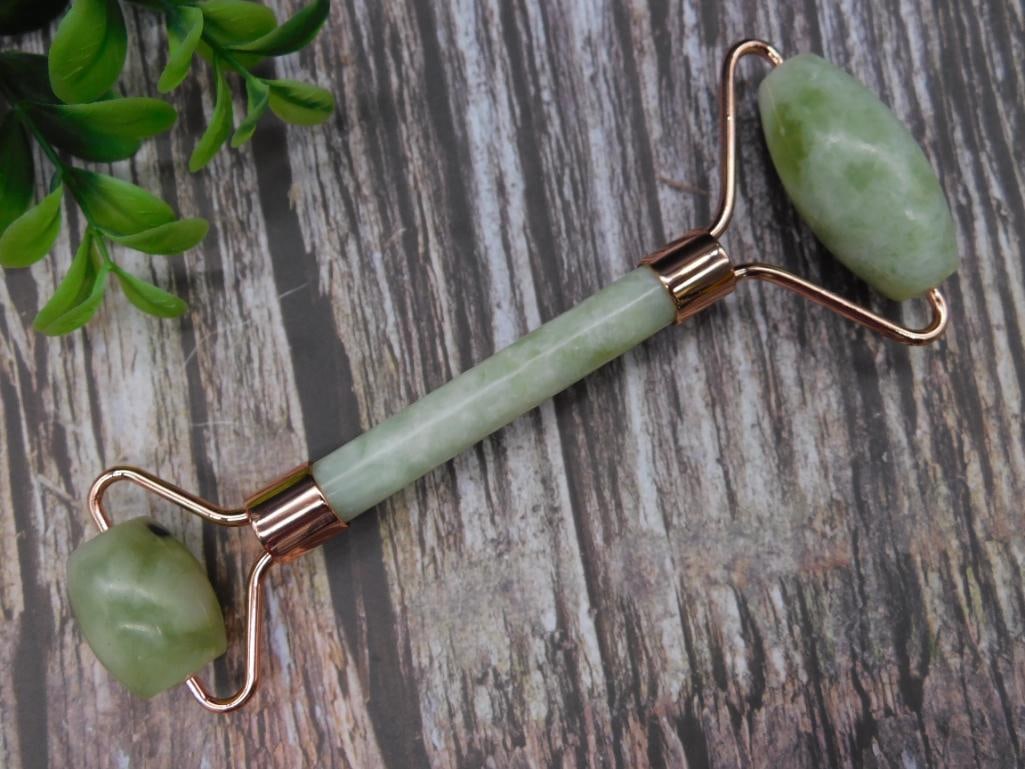 Dual-Ended Jade Facial Roller With Metal Accents: Dual-Ended Jade Facial Roller With Metal Accents