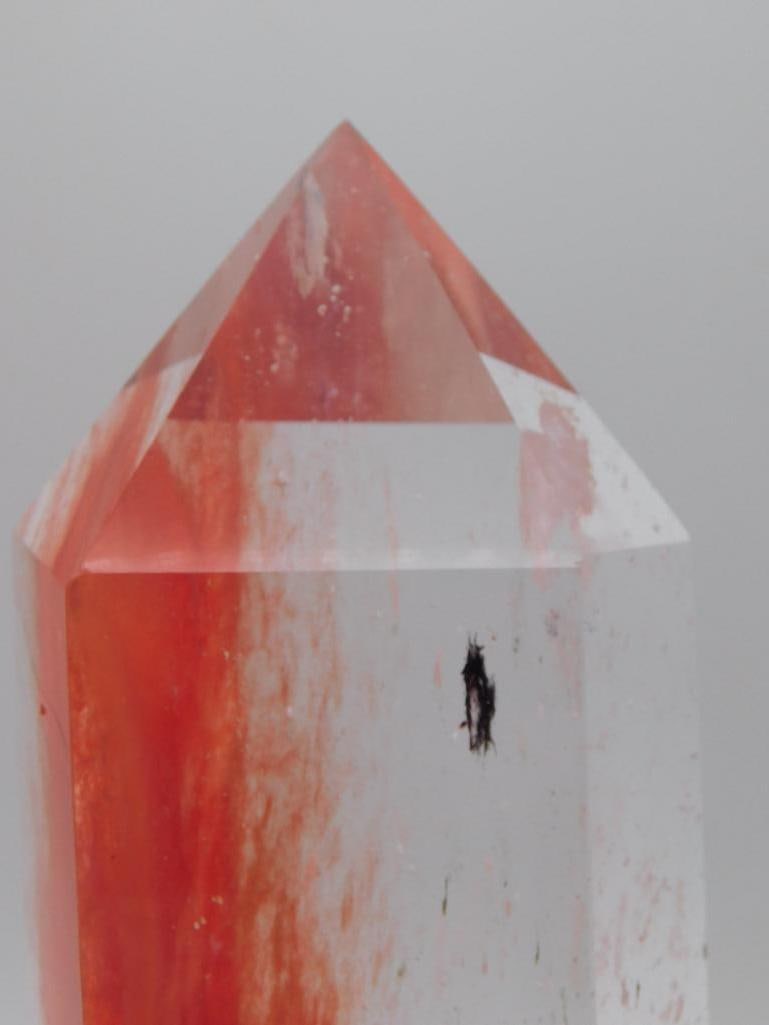 Clear Obelisk with Red and Black Inclusions: Clear Obelisk with Red and Black Inclusions