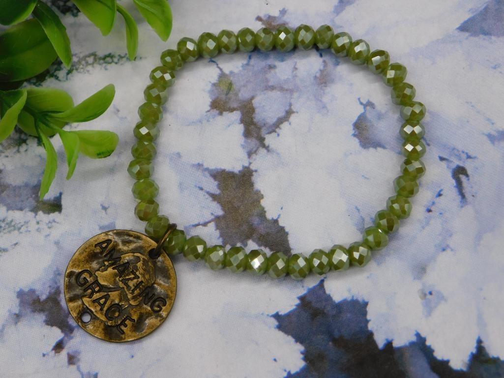 Green Beaded Bracelet With Engraved Charm: Green Beaded Bracelet With Engraved Charm