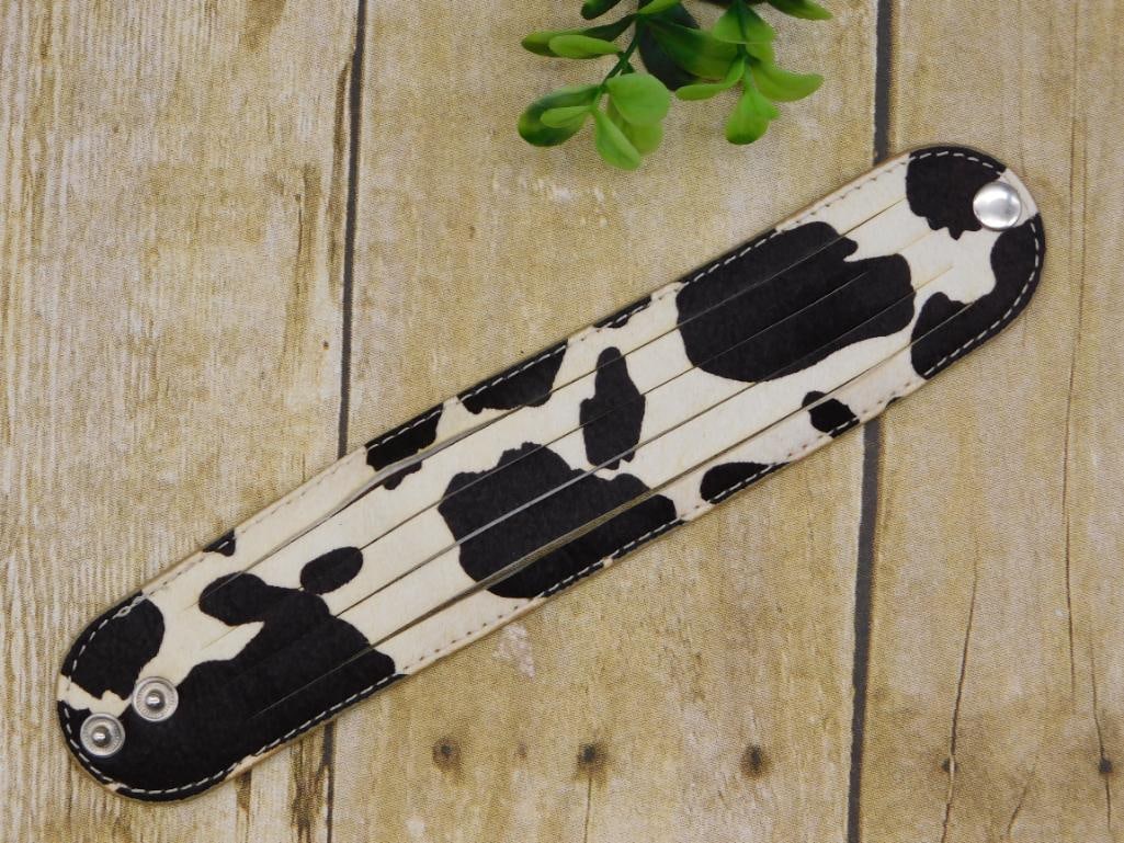 COW HIDE SNAP BRACELET: COW HIDE SNAP BRACELET