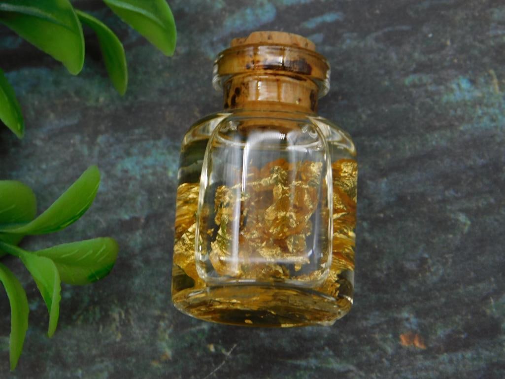 GOLD FLAKES IN BOTTLE ROCK STONE LAPIDARY SPECIMEN: GOLD FLAKES IN BOTTLE ROCK STONE LAPIDARY SPECIMEN