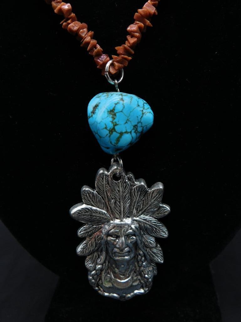 CHIEF PENDANT WITH TURQUOISE ACCENT ON GOLDSTONE CHIP NECKLACE: CHIEF PENDANT WITH TURQUOISE ACCENT ON GOLDSTONE CHIP NECKLACE