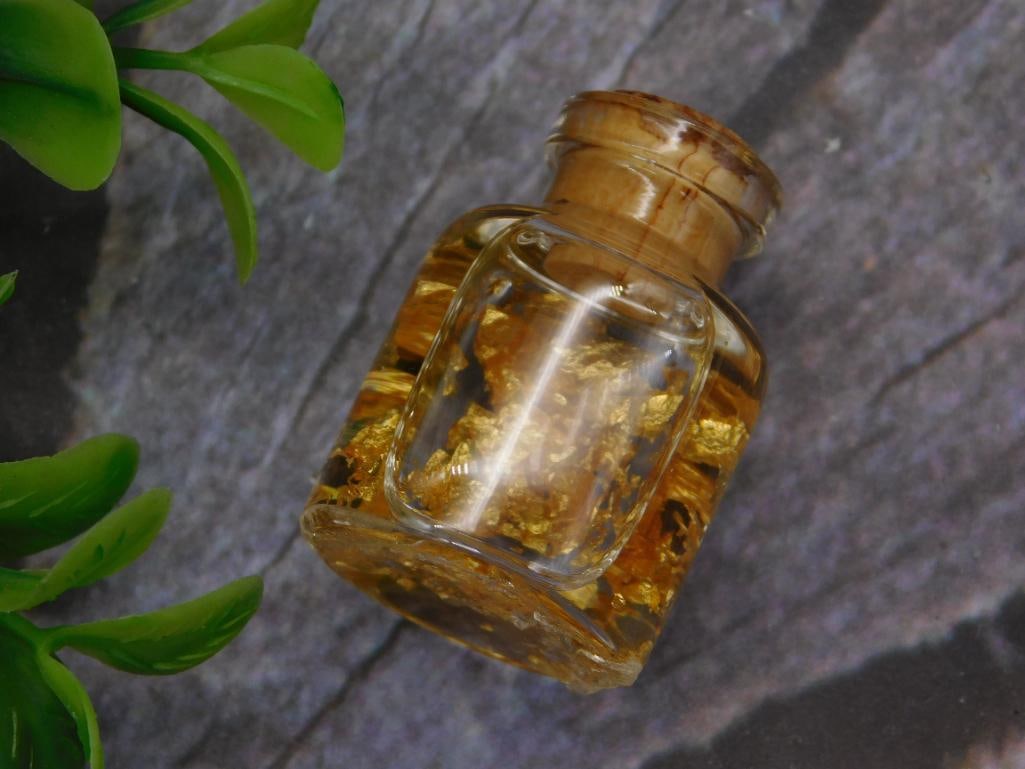 GOLD FLAKES IN BOTTLE ROCK STONE LAPIDARY SPECIMEN: GOLD FLAKES IN BOTTLE ROCK STONE LAPIDARY SPECIMEN