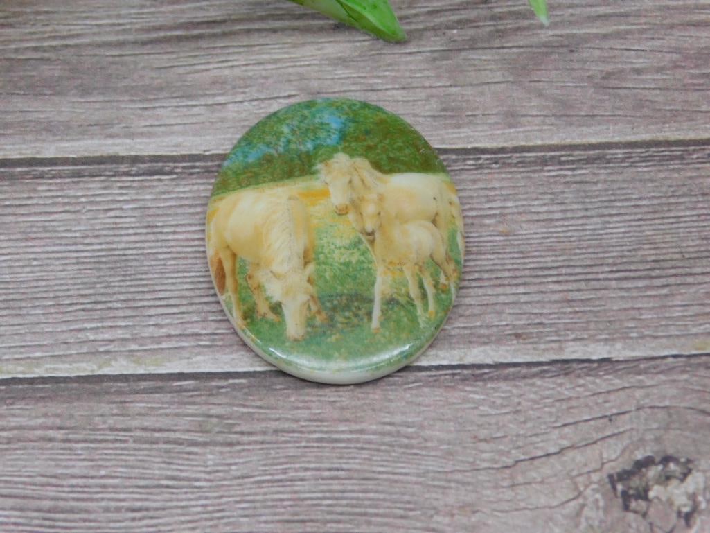 Oval Stone Cabochon Featuring Animal Engraving: Oval Stone Cabochon Featuring Animal Engraving