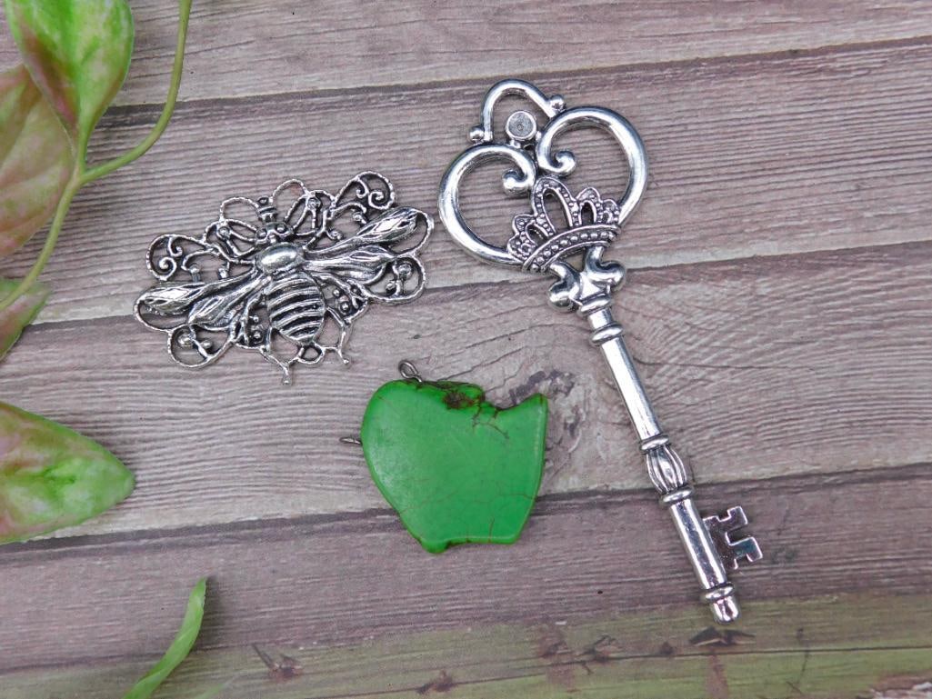 Decorative Key, Bee Pendant, and Green Charm Set: Decorative Key, Bee Pendant, and Green Charm Set