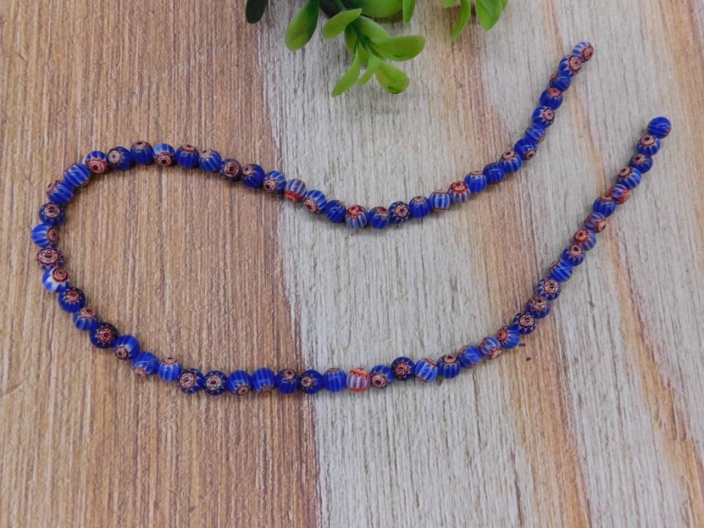 AFRICAN TRADE BEADS ON STRAND ROCK STONE LAPIDARY SPECIMEN: AFRICAN TRADE BEADS ON STRAND ROCK STONE LAPIDARY SPECIMEN