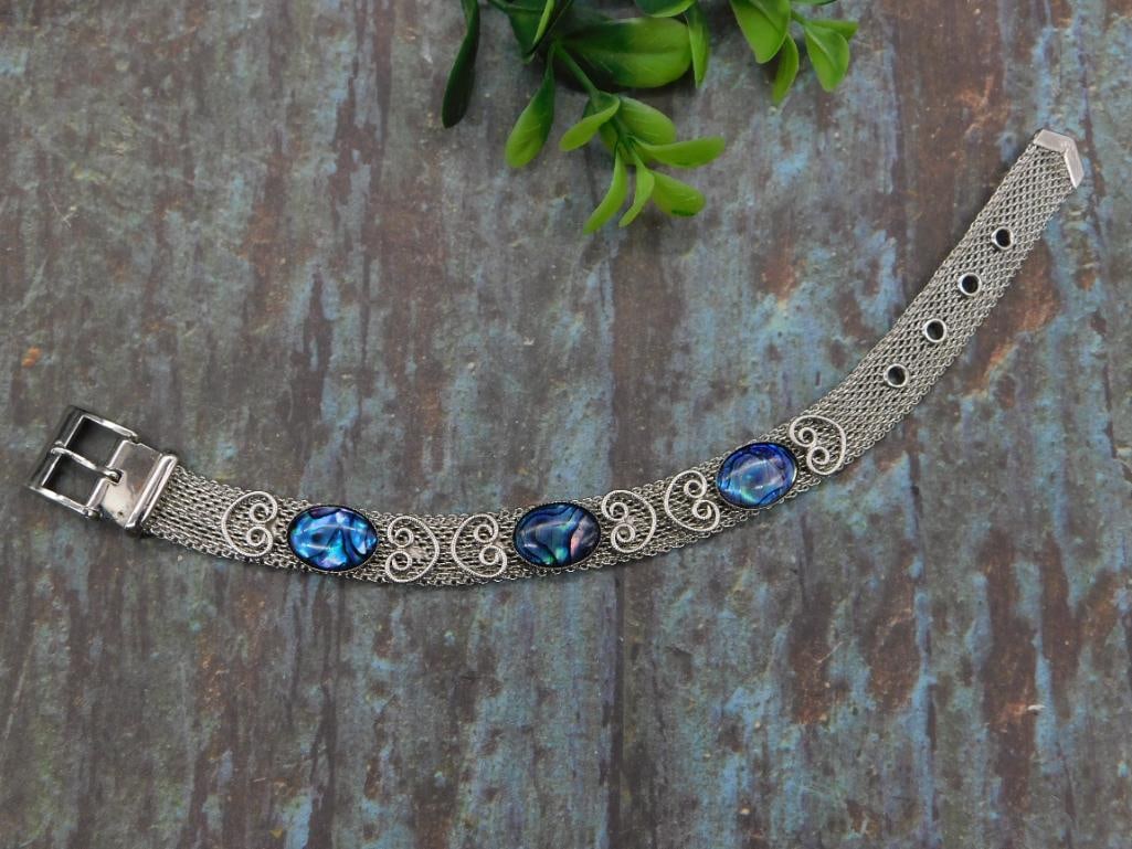 A ABALONE STUDDED BRACELET ROCK STONE LAPIDARY SPECIMEN: ABALONE STUDDED BRACELET ROCK STONE LAPIDARY SPECIMEN