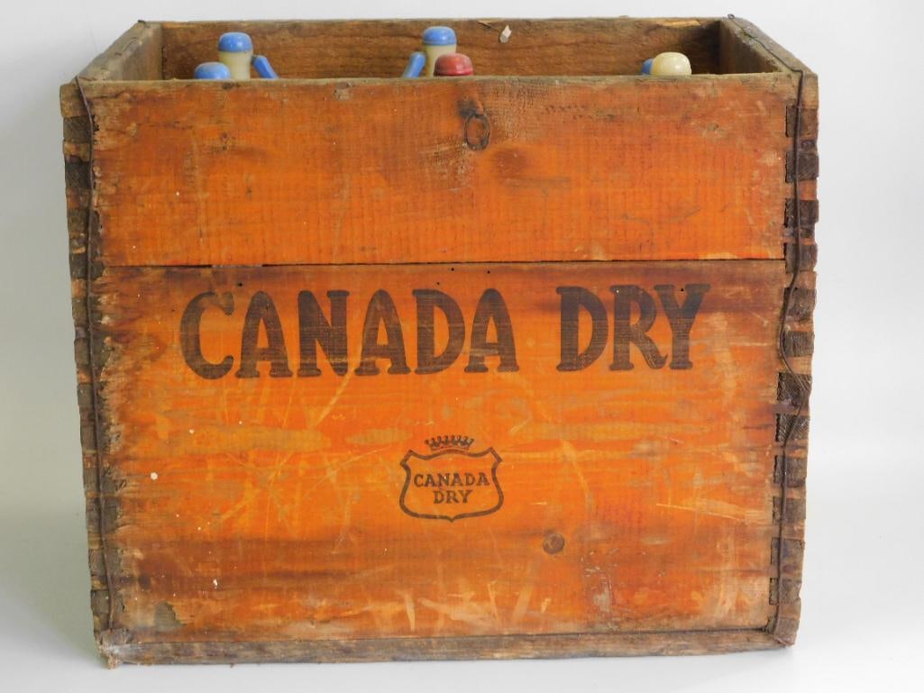 A CANADA DRY WOODEN CRATE FILLED WITH VINTAGE SELTZER BOTTLES, GLASS ADVERTISING SIPHON SYPHON MID: CANADA DRY WOODEN CRATE FILLED WITH VINTAGE SELTZER BOTTLES, GLASS ADVERTISING SIPHON SYPHON MID CENTURY BOTTLES