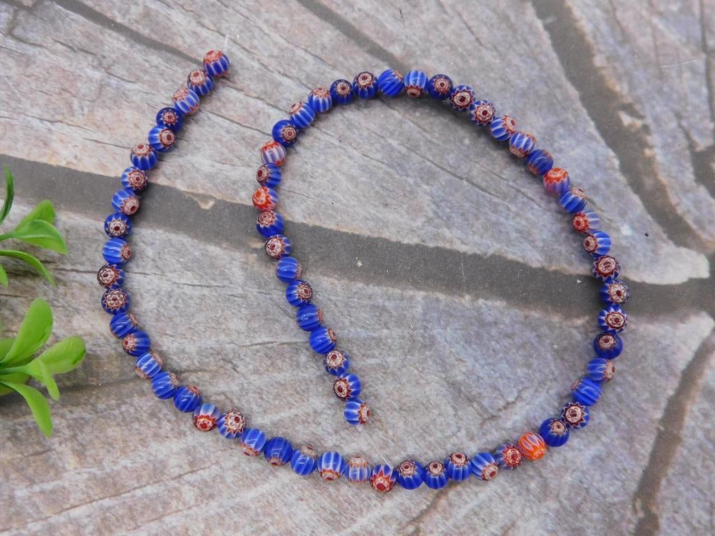 AFRICAN TRADE BEADS ON STRAND ROCK STONE LAPIDARY SPECIMEN: AFRICAN TRADE BEADS ON STRAND ROCK STONE LAPIDARY SPECIMEN