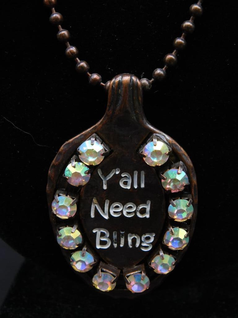 YALL NEED BLING SPOON PENDANT ON CHAIN NECKLACE: WELCOME TO HATMAN AUCTIONS! SPECIAL NOTICE: Please see photos for measurements and descriptions. ***Yes, we have in house shipping with MANY REPEAT CUSTOMERS because of our streamlined service.