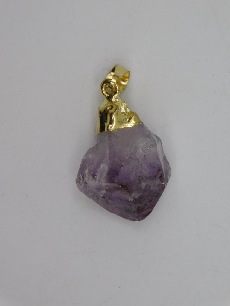 AMETHYST PENDANT ROCK STONE LAPIDARY SPECIMEN: WELCOME TO HATMAN AUCTIONS! SPECIAL NOTICE: Please see photos for measurements and descriptions. ***Yes, we have in house shipping with MANY REPEAT CUSTOMERS because of our streamlined service.