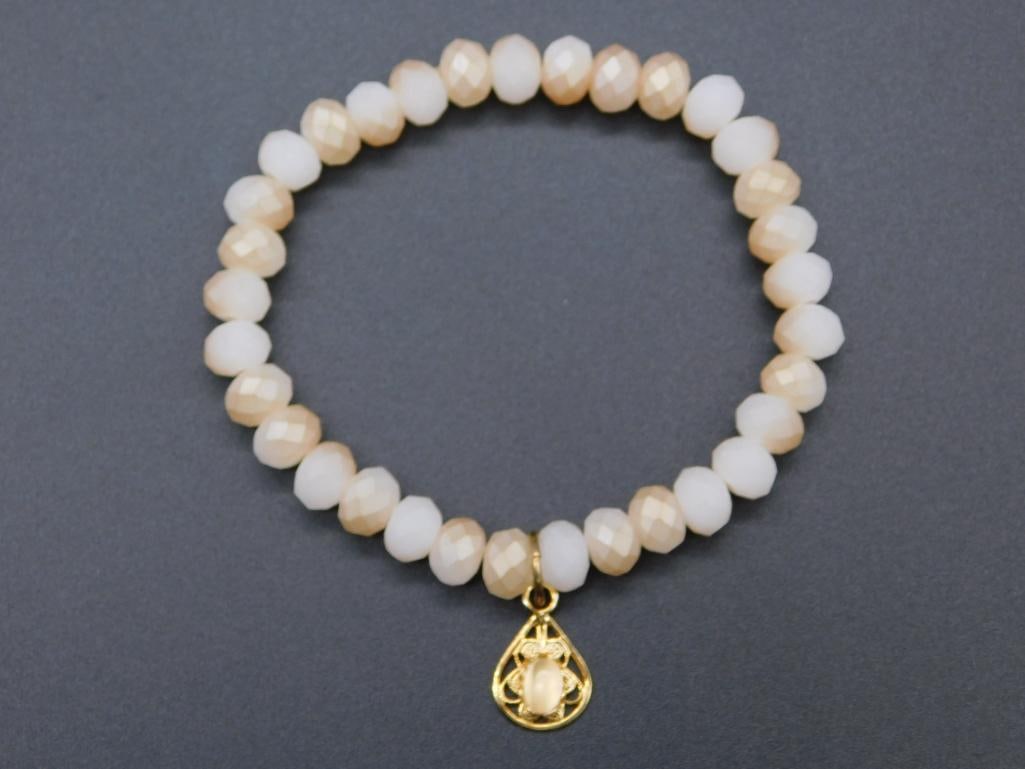 STONE BRACELET PENDANT ON SPARKLE BEAD BRACELET: Stone Bracelet Pendant On Sparkle Bead Bracelet ? Authentic estate find offered in our online auction. Perfect for collectors, resellers, and enthusiasts of vintage, antiques, minerals, rocks, crystal