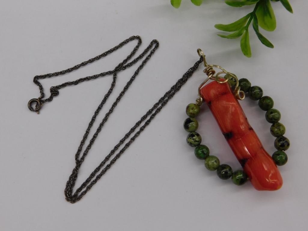 Vintage Coral Pendant Necklace With Green Bead Accents ROCK STONE LAPIDARY SPECIMEN: Vintage Coral Pendant Necklace With Green Bead Accents Rock Stone Lapidary Specimen ? Authentic estate find offered in our online auction. Perfect for collectors, resellers, and enthusiasts of