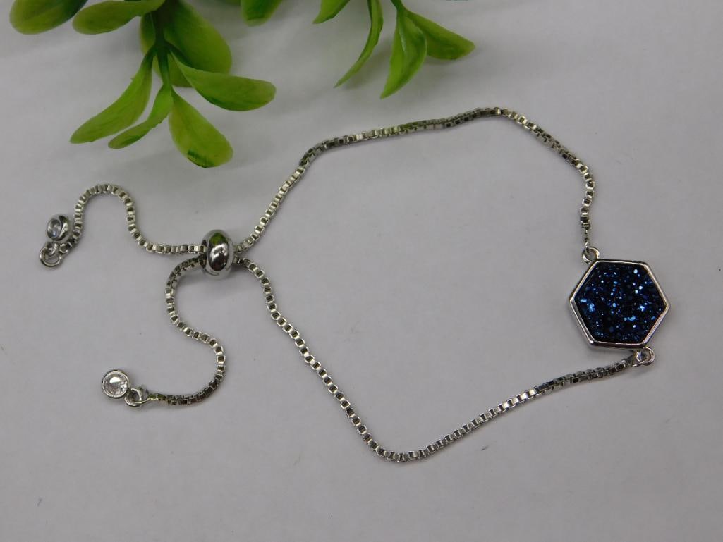 Silver-Tone Adjustable Bracelet with Blue Hexagon Pendant: Silver-Tone Adjustable Bracelet With Blue Hexagon Pendant ? Authentic estate find offered in our online auction. Perfect for collectors, resellers, and enthusiasts of vintage, antiques, minerals, rock