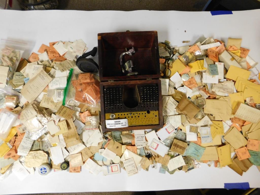 Estate Watchmaker Hoard 1000+ Pc Bulk Lot Vintage Watchmaking Tools, Parts & Repair Components: This massive Estate Watchmaker Hoard contains over 1,000 pieces of vintage watchmaking tools, parts, and micro-components accumulated over a lifetime on the bench. The lot includes crowns, gears,