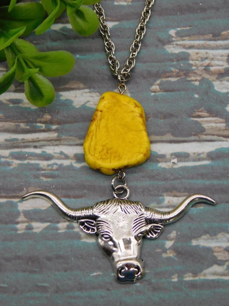 BULL HEAD PENDANT ON CHAIN NECKLACE ROCK STONE LAPIDARY SPECIMEN: BULL HEAD PENDANT ON CHAIN NECKLACE ROCK STONE LAPIDARY SPECIMEN — Part of our Discover Hidden Harbor, Crystals and Gems auction at HATMAN'S Auctions! Please see photos for measurements and