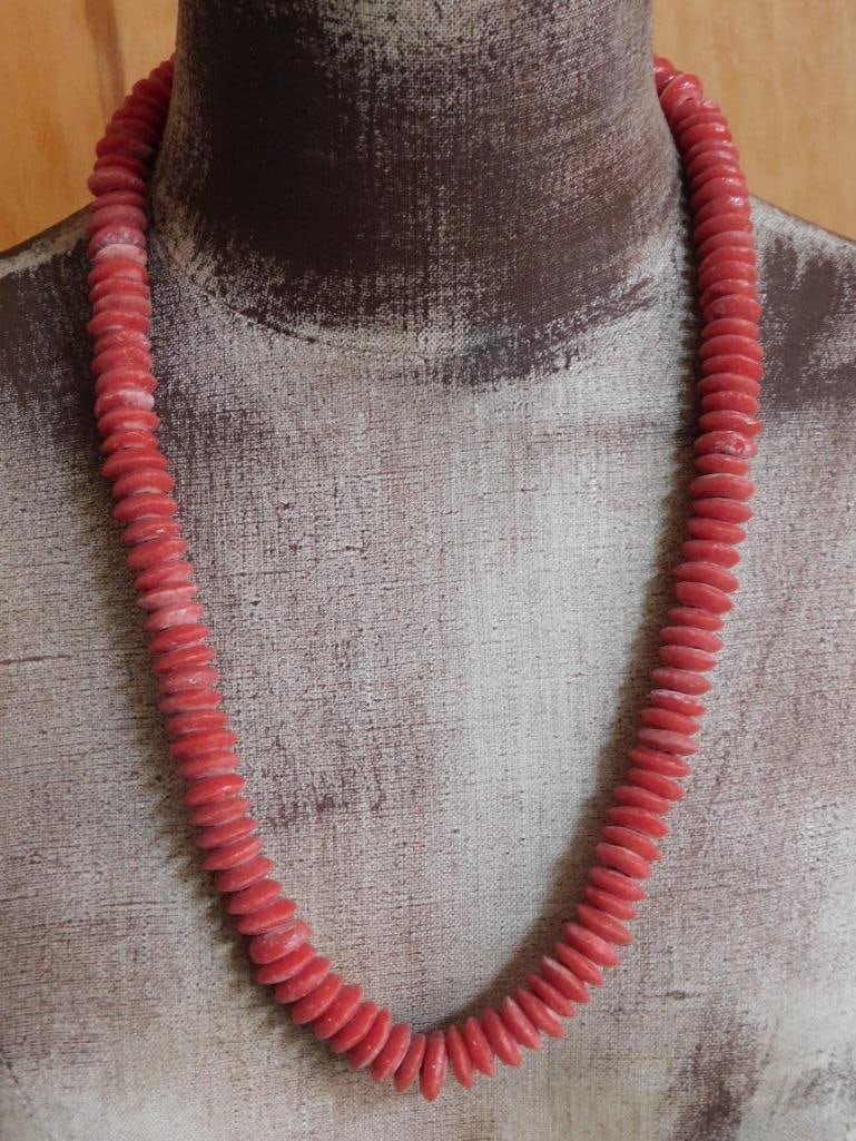 RED DISC AFRICAN TRADE BEAD NECKLACE: RED DISC AFRICAN TRADE BEAD NECKLACE — Part of our Discover Hidden Harbor, Crystals and Gems auction at HATMAN'S Auctions! Please see photos for measurements and condition. YES, we have in-house