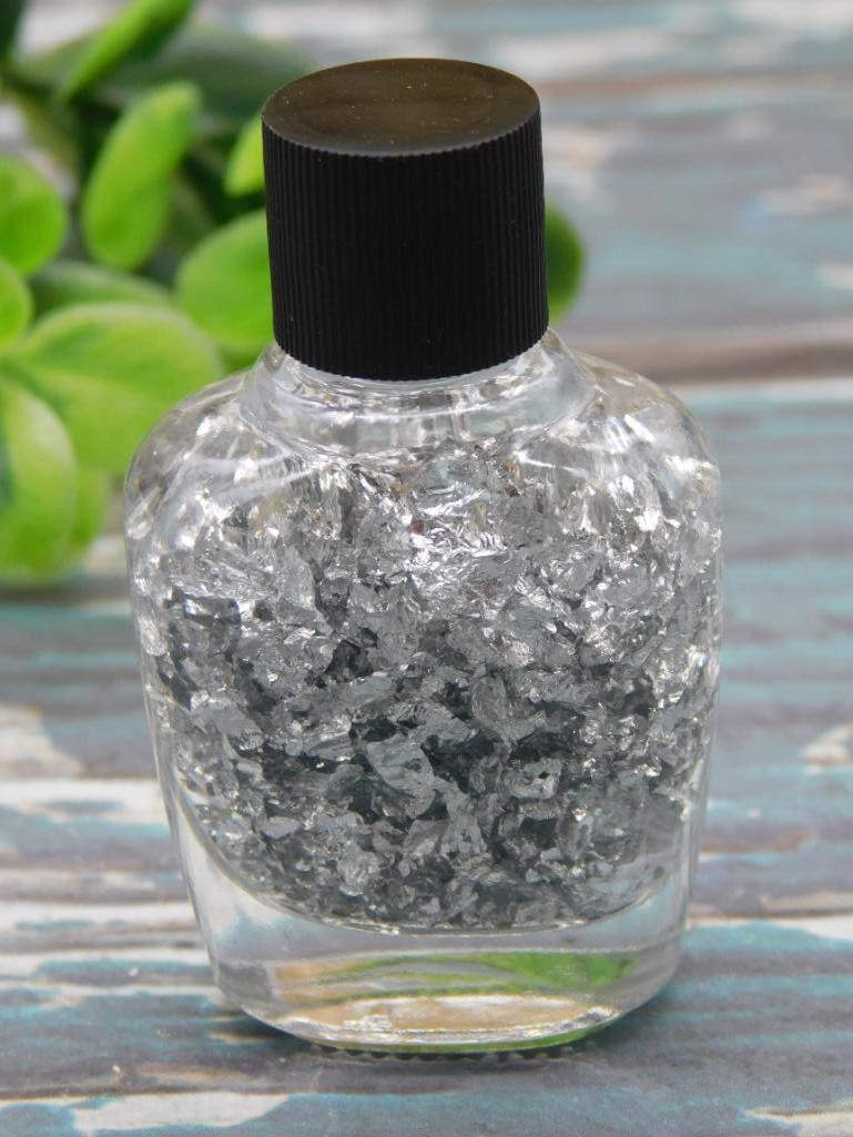 SILVER FLAKES IN BOTTLE ROCK STONE LAPIDARY SPECIMEN: SILVER FLAKES IN BOTTLE ROCK STONE LAPIDARY SPECIMEN — Part of our Discover Hidden Harbor, Crystals and Gems auction at HATMAN'S Auctions! Please see photos for measurements and condition. YES, we