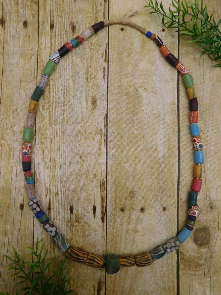 HAND PAINTED AFRICAN TRADE BEAD NECKLACE: HAND PAINTED AFRICAN TRADE BEAD NECKLACE — Part of our Discover Hidden Harbor, Crystals and Gems auction at HATMAN'S Auctions! Please see photos for measurements and condition. YES, we have