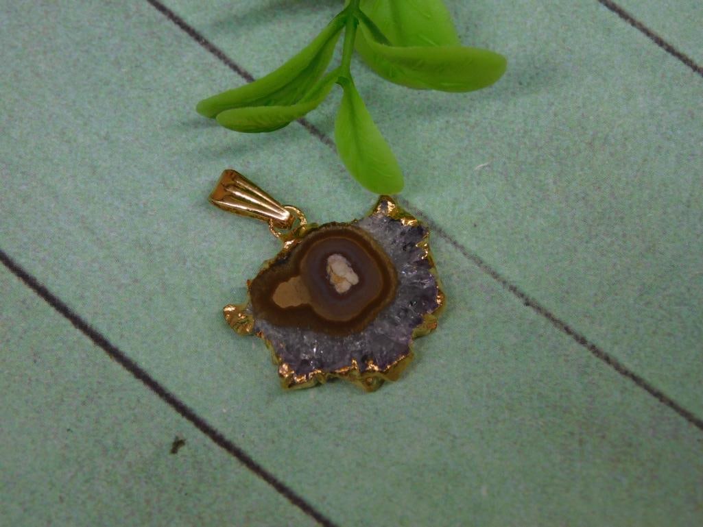 STALACTITE PENDANT ROCK STONE LAPIDARY SPECIMEN: STALACTITE PENDANT ROCK STONE LAPIDARY SPECIMEN — Part of our Discover Hidden Harbor, Crystals and Gems auction at HATMAN'S Auctions! Please see photos for measurements and condition. YES, we have