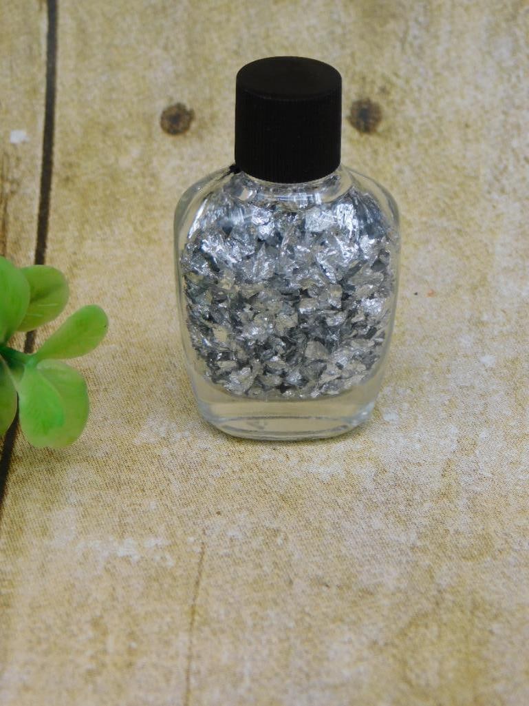 SILVER FLAKES IN BOTTLE ROCK STONE LAPIDARY SPECIMEN: SILVER FLAKES IN BOTTLE ROCK STONE LAPIDARY SPECIMEN - Part of our Discover Golden Attic, Crystals and Gems auction at HATMAN'S Auctions! Please see photos for measurements and condition. YES, we have