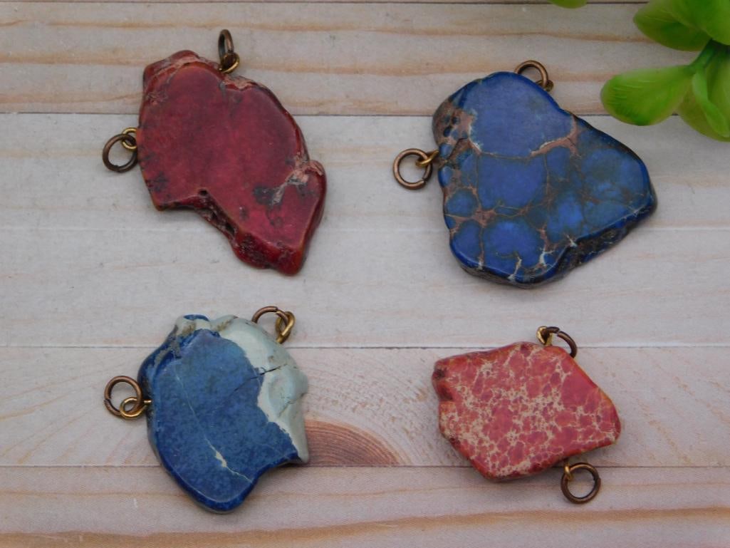 IMPRESSION JASPER PENDANTS ROCK STONE LAPIDARY SPECIMEN: IMPRESSION JASPER PENDANTS ROCK STONE LAPIDARY SPECIMEN - Part of our Discover Midnight Market, Crystals and Gems auction at HATMAN'S Auctions! Please see photos for measurements and condition. YES,