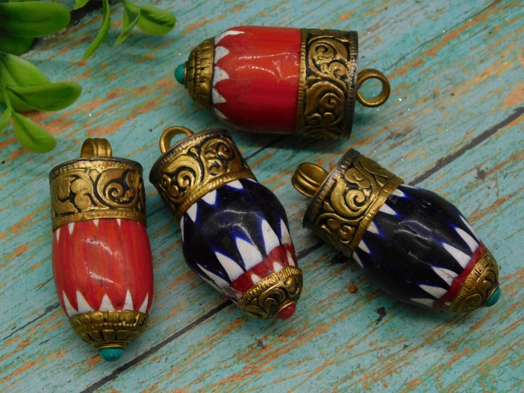 TIBETAN BEAD PENDANTS: TIBETAN BEAD PENDANTS - Part of our Discover Midnight Market, Crystals and Gems auction at HATMAN'S Auctions! Please see photos for measurements and condition. YES, we have in-house shipping! We have