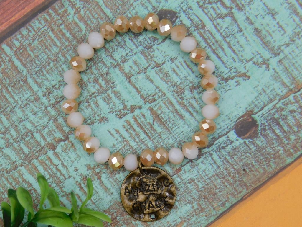 AMAZING GRACE PENDANT ON SPARKLE BEAD BRACELET: AMAZING GRACE PENDANT ON SPARKLE BEAD BRACELET - Part of our Discover Midnight Market, Crystals and Gems auction at HATMAN'S Auctions! Please see photos for measurements and condition. YES, we have in