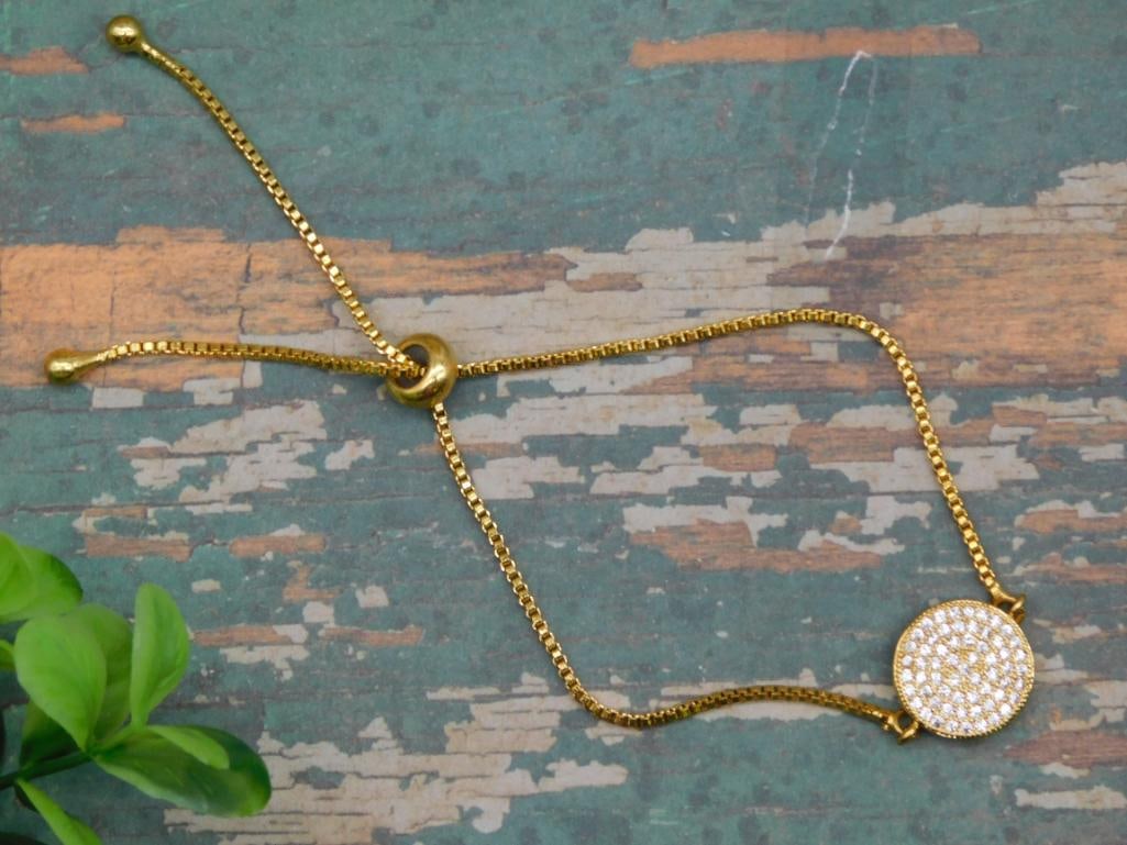 ADJUSTABLE BRACELET: ADJUSTABLE BRACELET - Part of our Discover Midnight Market, Crystals and Gems auction at HATMAN'S Auctions! Please see photos for measurements and condition. YES, we have in-house shipping! We have