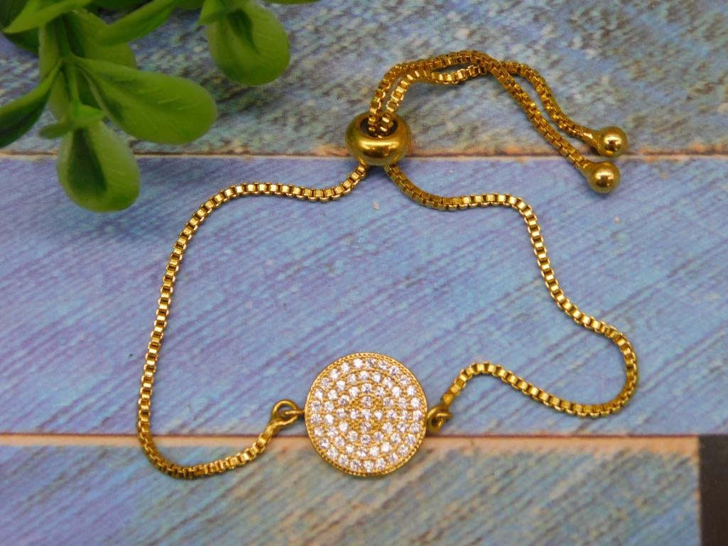 ADJUSTABLE BRACELET: ADJUSTABLE BRACELET - Part of our Discover Midnight Market, Crystals and Gems auction at HATMAN'S Auctions! Please see photos for measurements and condition. YES, we have in-house shipping! We have