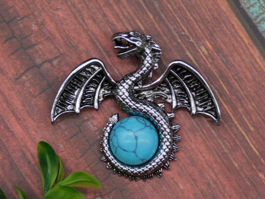 TURQUOISE DRAGON BROOCH ROCK STONE LAPIDARY SPECIMEN: TURQUOISE DRAGON BROOCH ROCK STONE LAPIDARY SPECIMEN - Part of our Discover Midnight Market, Crystals and Gems auction at HATMAN'S Auctions! Please see photos for measurements and condition. YES, we