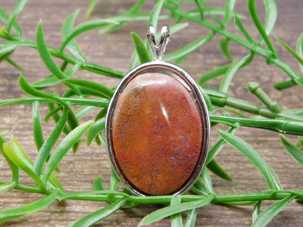 FLAME PLUME PENDANT ROCK STONE LAPIDARY SPECIMEN: FLAME PLUME PENDANT ROCK STONE LAPIDARY SPECIMEN - Part of our Discover Midnight Market, Crystals and Gems auction at HATMAN'S Auctions! Please see photos for measurements and condition. YES, we have