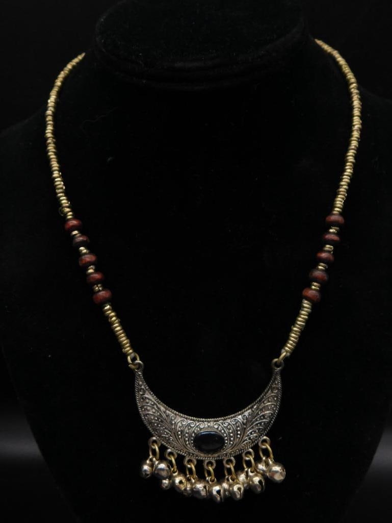 ONYX CRESCENT MOON NECKLACE WITH BELLS ROCK STONE LAPIDARY SPECIMEN: ONYX CRESCENT MOON NECKLACE WITH BELLS ROCK STONE LAPIDARY SPECIMEN — Part of our Discover Vintage Vault, Crystals and Gems auction at HATMAN'S Auctions! Please see photos for measurements and