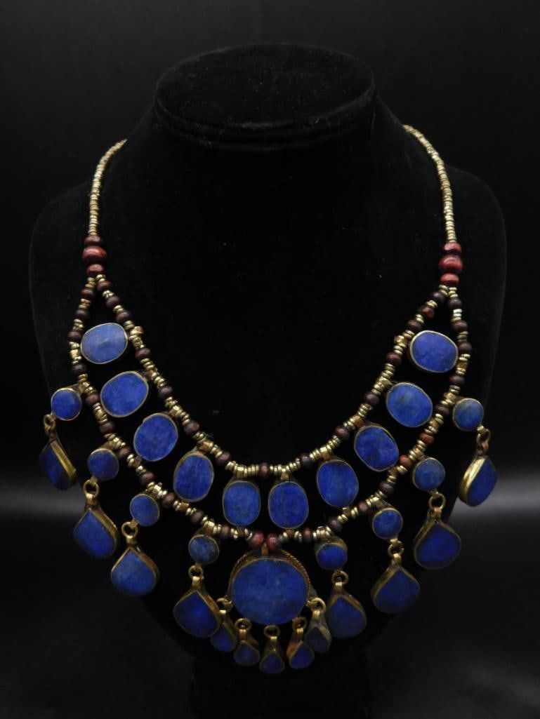 LAPIS LAZULI BIB STYLE NECKLACE ROCK STONE LAPIDARY SPECIMEN: LAPIS LAZULI BIB STYLE NECKLACE ROCK STONE LAPIDARY SPECIMEN — Part of our Discover Vintage Vault, Crystals and Gems auction at HATMAN'S Auctions! Please see photos for measurements and condition. Y