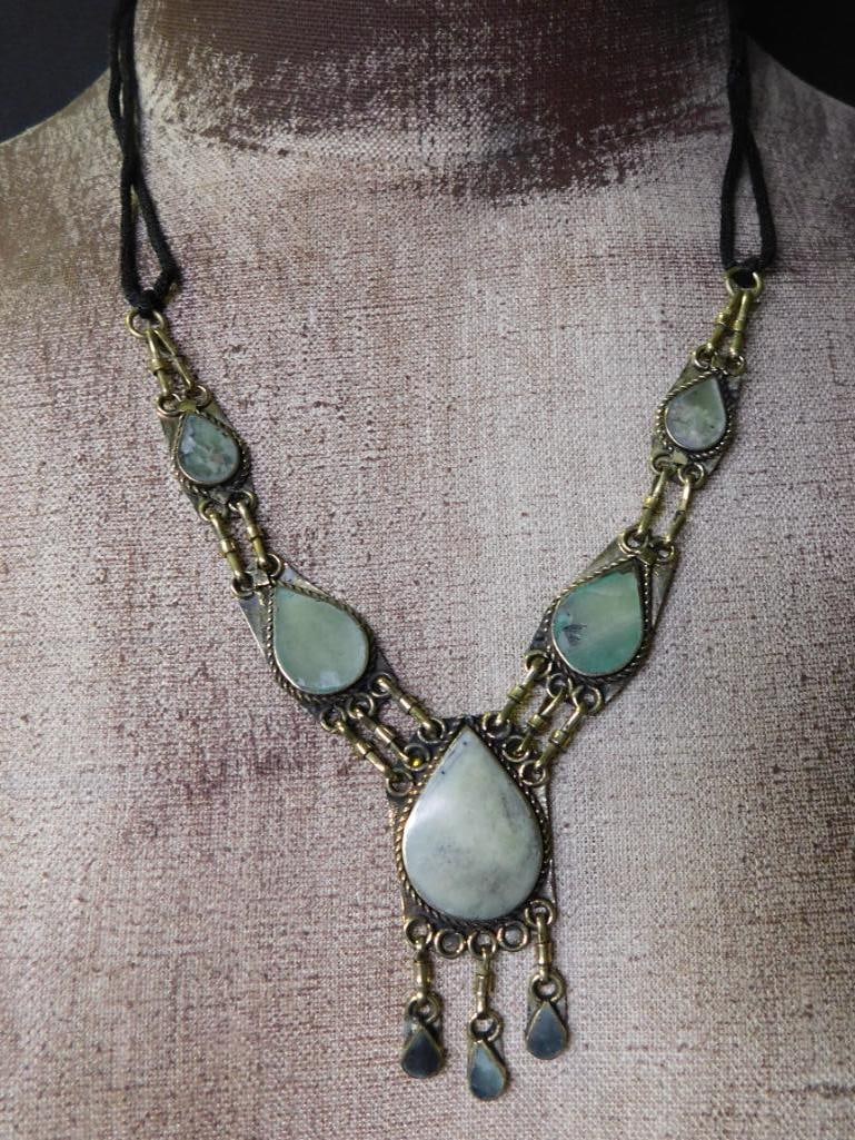 JADE TEARDROP STYLE NECKLACE ROCK STONE LAPIDARY SPECIMEN: JADE TEARDROP STYLE NECKLACE ROCK STONE LAPIDARY SPECIMEN — Part of our Discover Vintage Vault, Crystals and Gems auction at HATMAN'S Auctions! Please see photos for measurements and condition.
