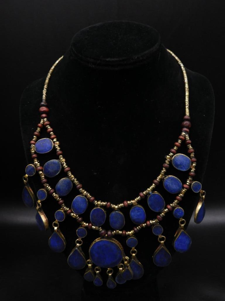 LAPIS LAZULI BIB STYLE NECKLACE ROCK STONE LAPIDARY SPECIMEN: LAPIS LAZULI BIB STYLE NECKLACE ROCK STONE LAPIDARY SPECIMEN — Part of our Discover Vintage Vault, Crystals and Gems auction at HATMAN'S Auctions! Please see photos for measurements and condition.