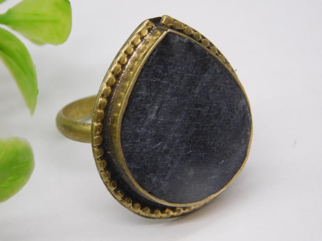 PEAR SHAPED STONE RING SIZE 9 ROCK STONE LAPIDARY SPECIMEN: PEAR SHAPED STONE RING SIZE 9 ROCK STONE LAPIDARY SPECIMEN — Part of our Discover Vintage Vault, Crystals and Gems auction at HATMAN'S Auctions! Please see photos for measurements and condition. YES