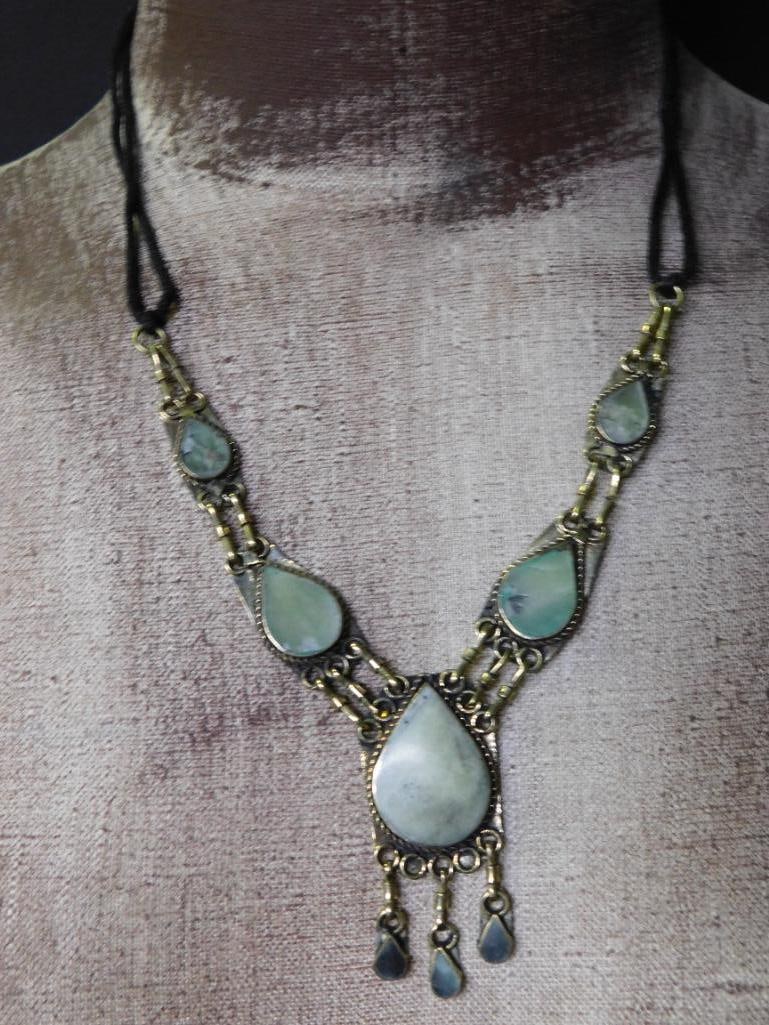 JADE TEARDROP STYLE NECKLACE ROCK STONE LAPIDARY SPECIMEN: JADE TEARDROP STYLE NECKLACE ROCK STONE LAPIDARY SPECIMEN — Part of our Discover Vintage Vault, Crystals and Gems auction at HATMAN'S Auctions! Please see photos for measurements and condition.
