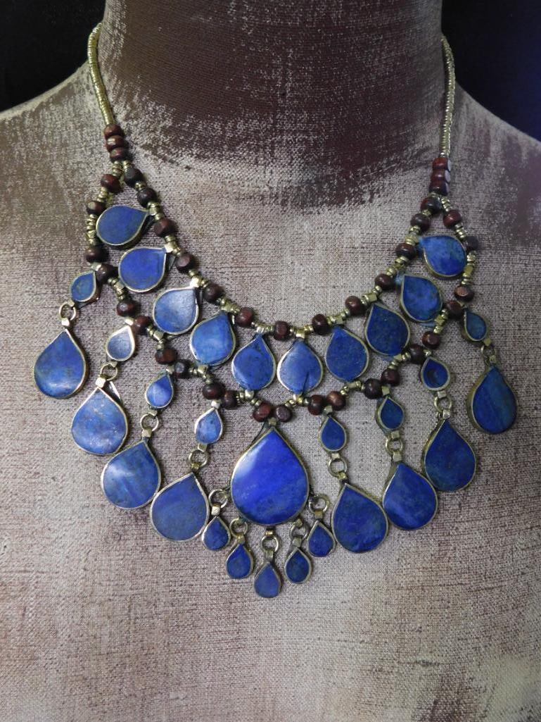 LAPIS LAZULI BIB STYLE NECKLACE ROCK STONE LAPIDARY SPECIMEN: LAPIS LAZULI BIB STYLE NECKLACE ROCK STONE LAPIDARY SPECIMEN — Part of our Discover Vintage Vault, Crystals and Gems auction at HATMAN'S Auctions! Please see photos for measurements and condition.