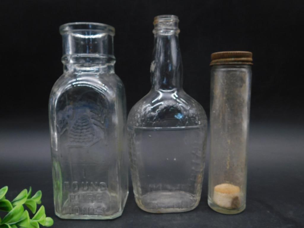 Set of Three Assorted Vintage Glass Bottles: Set of Three Assorted Vintage Glass Bottles — Part of our Discover Vintage Vault, Crystals and Gems auction at HATMAN'S Auctions! Please see photos for measurements and condition. YES, we have
