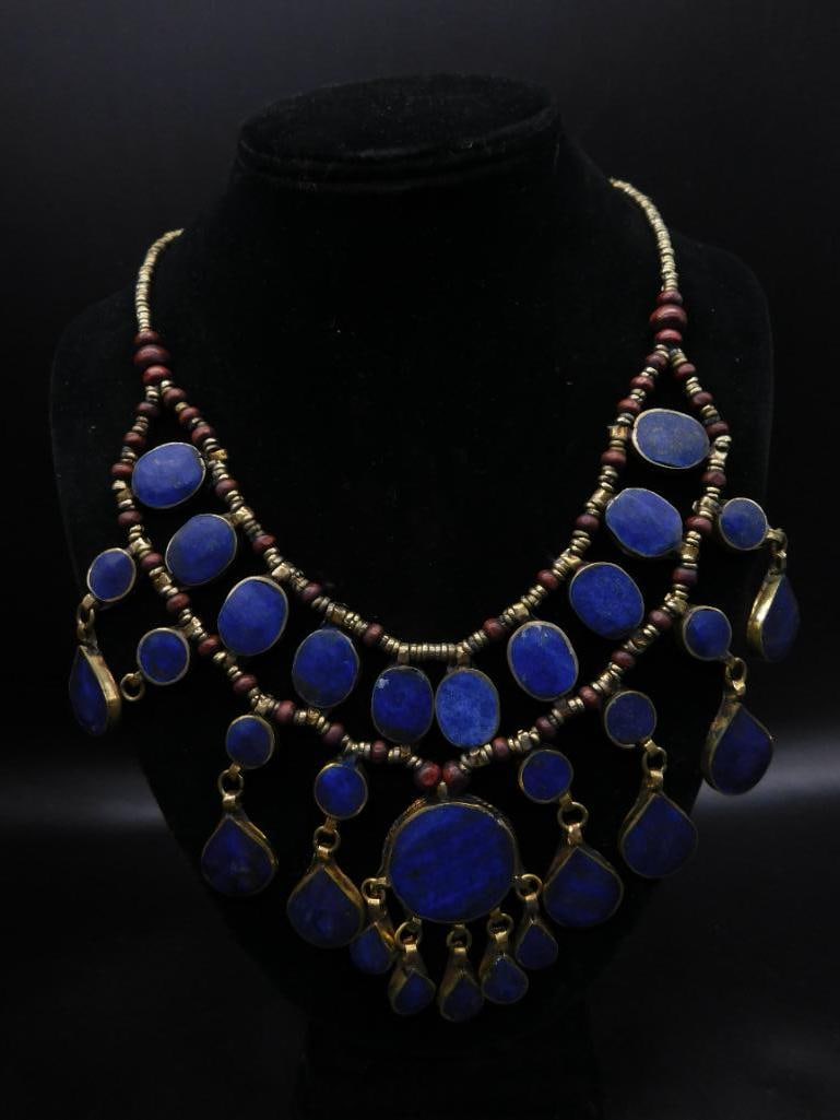 LAPIS LAZULI BIB STYLE NECKLACE ROCK STONE LAPIDARY SPECIMEN: LAPIS LAZULI BIB STYLE NECKLACE ROCK STONE LAPIDARY SPECIMEN — Part of our Discover Vintage Vault, Crystals and Gems auction at HATMAN'S Auctions! Please see photos for measurements and condition.