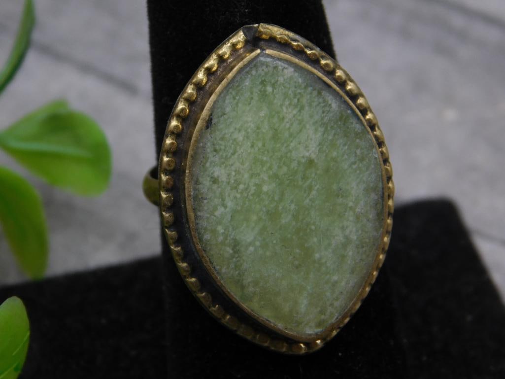 PREHNITE RING SIZE 8 ROCK STONE LAPIDARY SPECIMEN: PREHNITE RING SIZE 8 ROCK STONE LAPIDARY SPECIMEN — Part of our Discover Vintage Vault, Crystals and Gems auction at HATMAN'S Auctions! Please see photos for measurements and condition. YES, we