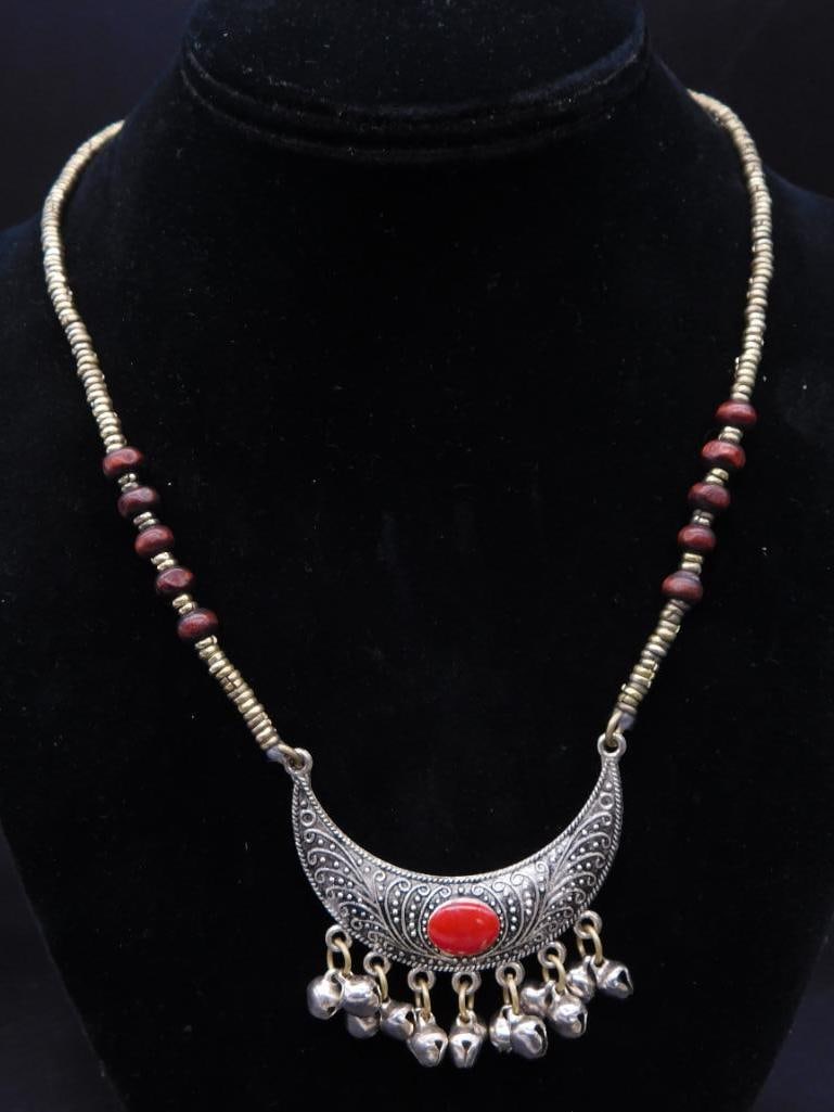 RED JASPER CRESCENT MOON NECKLACE WITH BELLS ROCK STONE LAPIDARY SPECIMEN: RED JASPER CRESCENT MOON NECKLACE WITH BELLS ROCK STONE LAPIDARY SPECIMEN — Part of our Discover Vintage Vault, Crystals and Gems auction at HATMAN'S Auctions! Please see photos for measurements