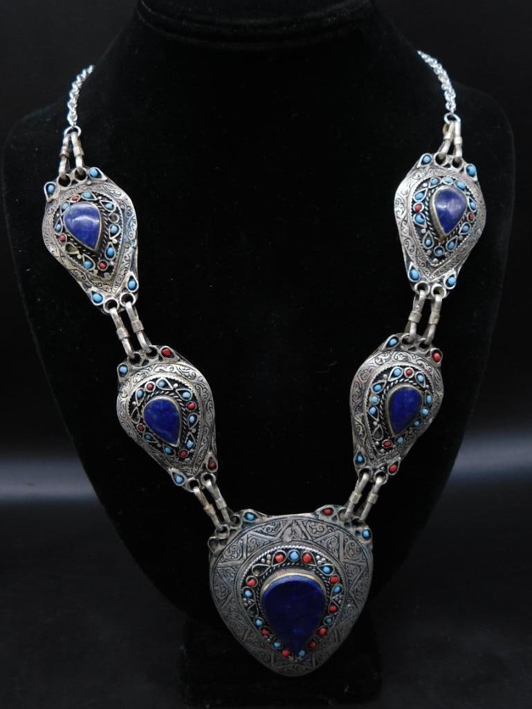 LAPIS LAZULI MEDALLION NECKLACE ROCK STONE LAPIDARY SPECIMEN: LAPIS LAZULI MEDALLION NECKLACE ROCK STONE LAPIDARY SPECIMEN — Part of our Discover Vintage Vault, Crystals and Gems auction at HATMAN'S Auctions! Please see photos for measurements and condition.